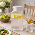 glass water jug with plastic lid 1.74L premium beverage pitcher for water juice and cold drinks  glass water jug Pakistan glass beverage pitcher 1.74L water jug with lid juice pitcher Pakistan glass serving jug beverage pitcher with lid lemonade pitcher glass Home Hatch drinkware glass water pitcher premium beverage jug